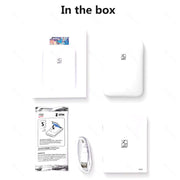 Contents of the MT53 portable printer box including printer, photo papers, USB cable, and instructions.